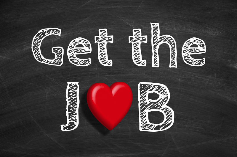 Text Get the job is written on the blackboard background with the letter o as a heart