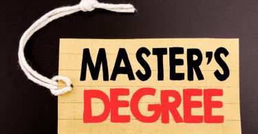 masters degree written on price tag paper on black vintage background
